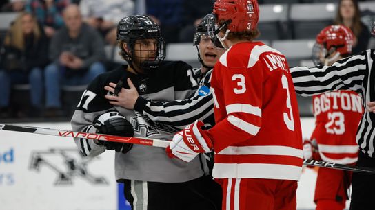 Chase Yoder (left) in a game against Boston University.